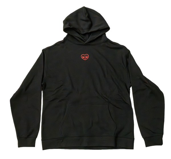 Black hoodie with a red heart logo on a white background