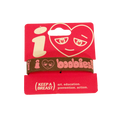 Red wristband with heart design and text on a white background