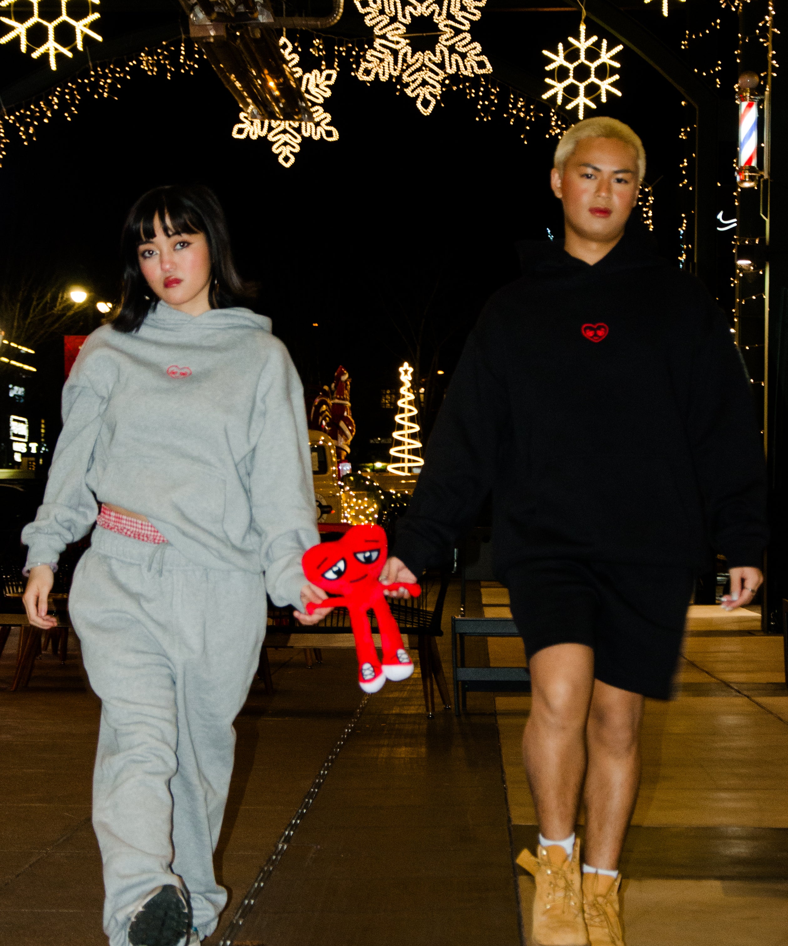 Shay(left) is 5'2 wearing small and Julian(right) is 5'4 wearing medium