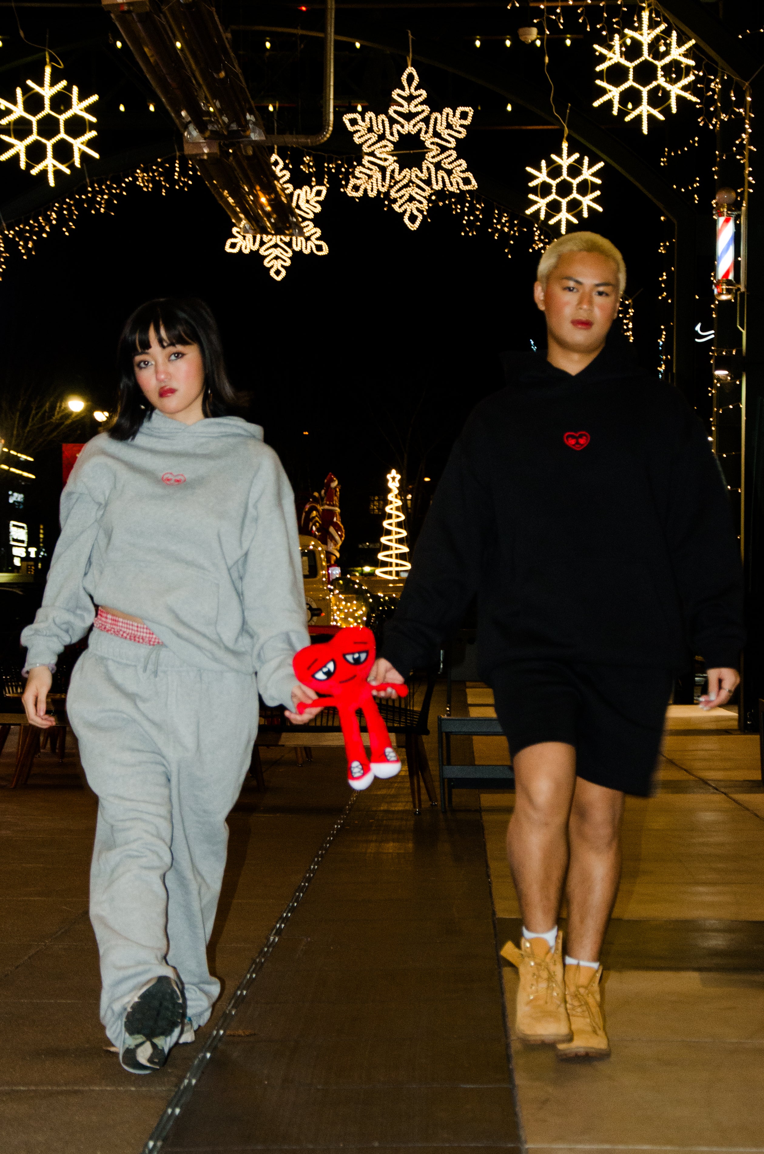 Shay(left) is 5'2 wearing small and Julian(right) is 5'4 wearing medium