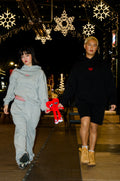 Shay(left) is 5'2 wearing small and Julian(right) is 5'4 wearing medium