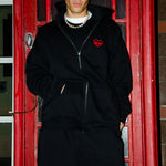 Danny is 5'5 wearing medium