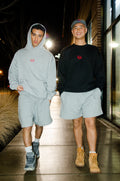 Danny(left) is 5'5 wearing medium and Julian(right) is wearing medium
