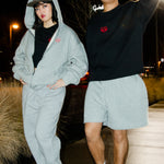 Shay(left) is 5'1 wearing small and Julian(right) is 5'4 wearing small