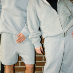 Danny(left) is 5'5 wearing medium and Shay(right) is 5'1 wearing small.